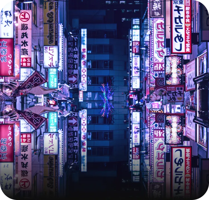 Tokyo de nuit, éclairée par des enseignes publicitaires